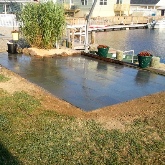 Country Lawn Care Inc waterfront bluestone patio on bay